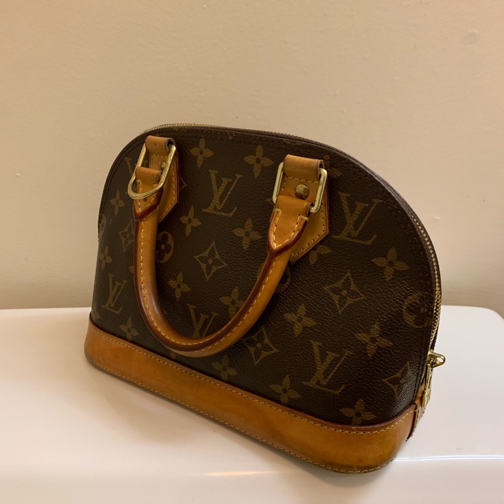 Mini Louis Vuitton Alma Bag